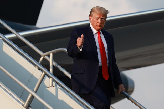 <p>Donald Trump arrives in Atlanta for to be booked on election interference charges last month </p>