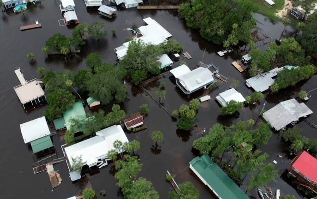 <p>This aerial photo shows homes surrounded by floodwaters in Steinhatchee, Florida on Wednesday after Hurricane Idalia </p>