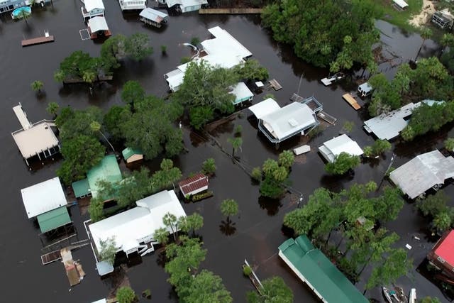 <p>This aerial photo shows homes surrounded by floodwaters in Steinhatchee, Florida on Wednesday after Hurricane Idalia </p>