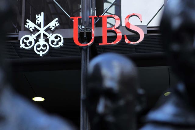 Swiss bank UBS has reported a bumper profit of £22.8 billion in the latest quarter (Sean Dempsey/PA)
