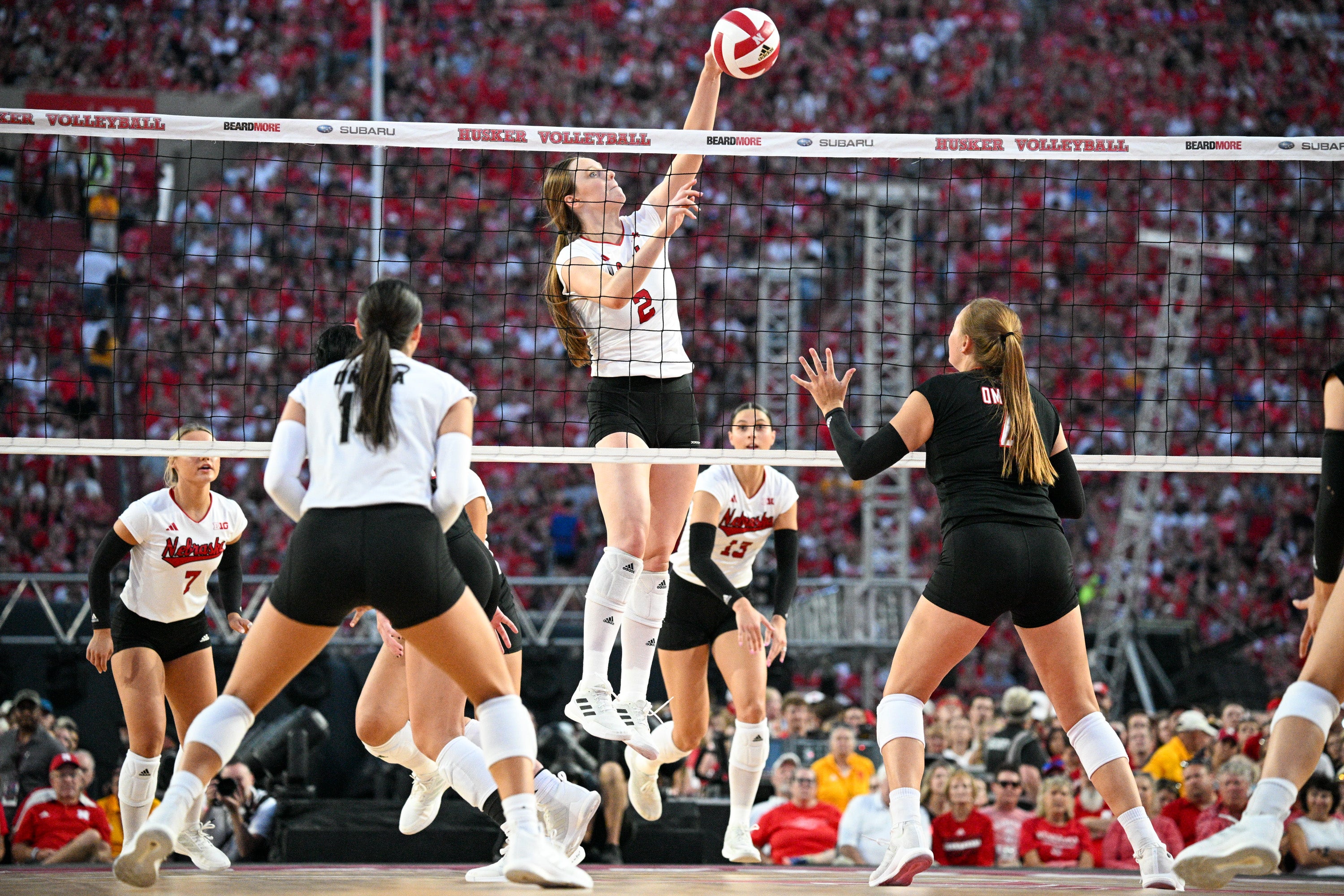 University volleyball match breaks attendance record for women s sport
