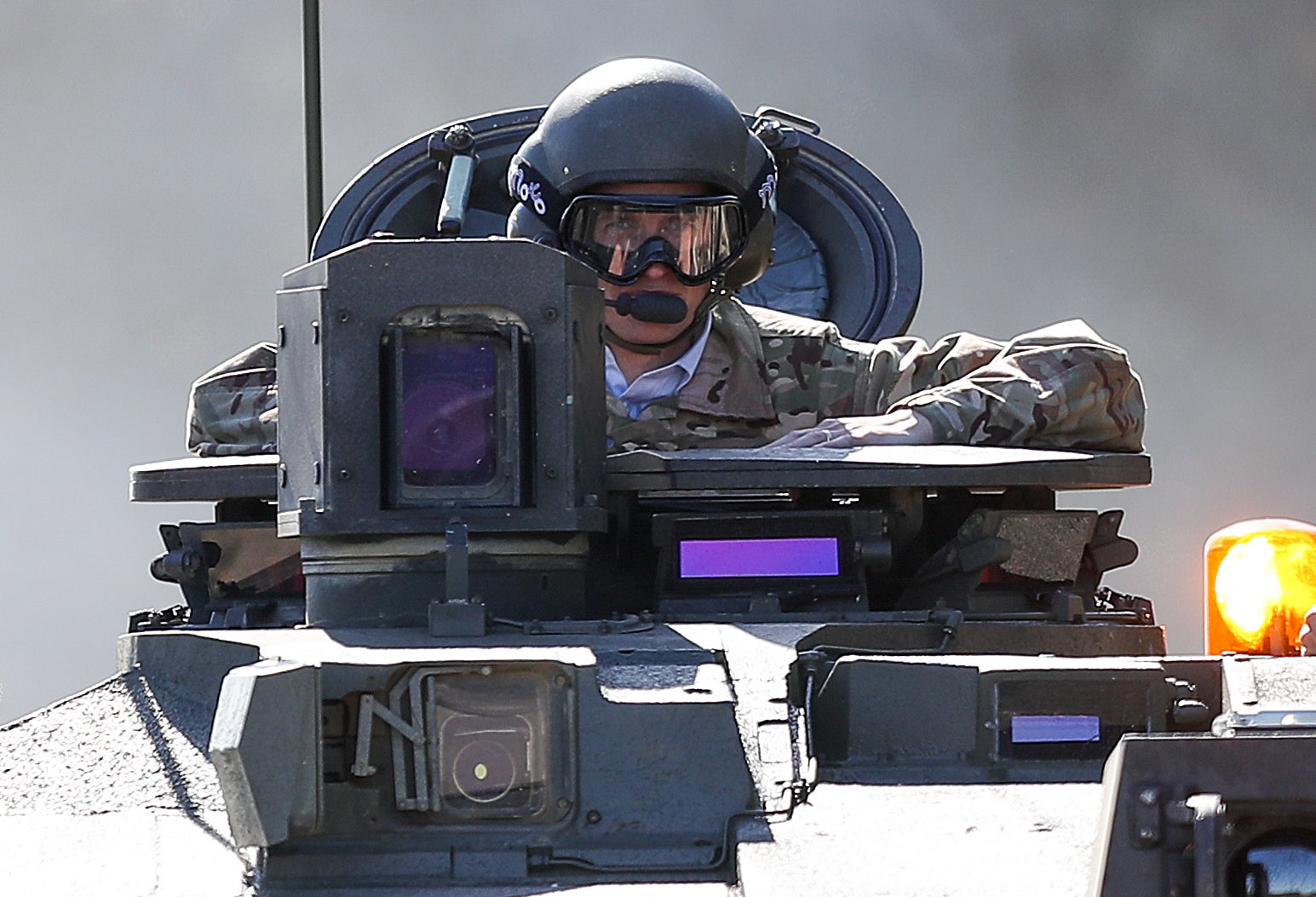 Gavin Williamson takes a ride in a Challenger 2 tank in 2019