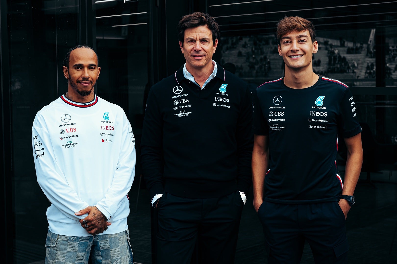 Lewis Hamilton and George Russell have extended their contracts with Toto Wolff, centre, at Mercedes