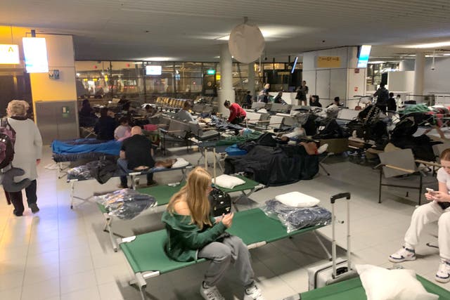 Thousands of stranded holidaymakers are being forced to wait several days for flights home despite airline schedules returning to normal following an air traffic control failure (Matthew Creed/PA)