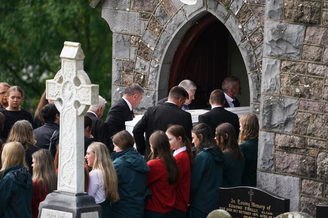 The coffin of Nicole Murphy is carried into St John the Baptist Church in Kilcash, near Clonmel, Co Tipperary ahead of her funeral (Brian Lawless/PA)
