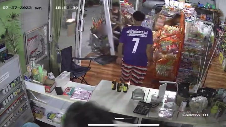 <p>Motorcyclist with toddler on his lap crashes through glass shopfront.</p>