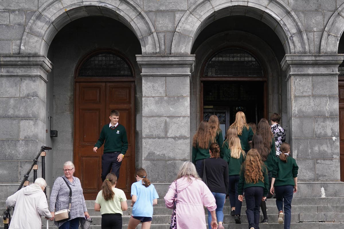 Large crowds attend service for grandparents and boy killed in Cashel crash