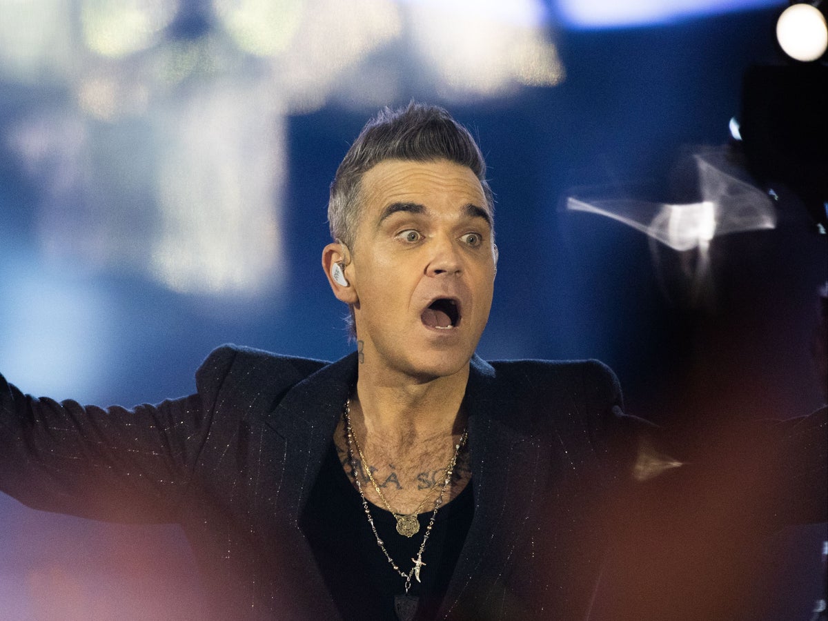Robbie Williams recalls embarrassing on-stage incident with Take That after suffering from food poisoning