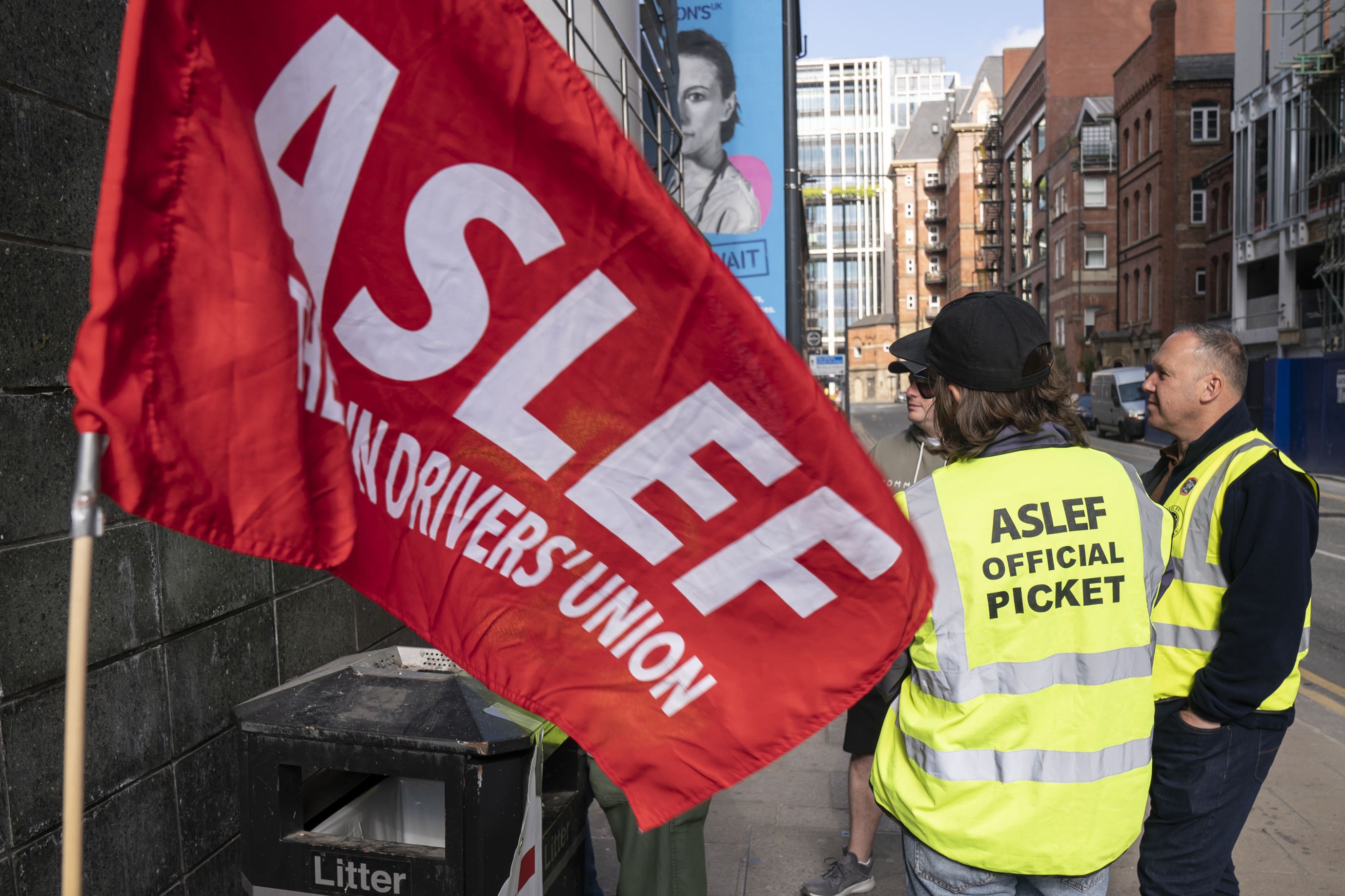 Members of the Aslef union on a picket line near Leeds railway station (Danny Lawson/PA)