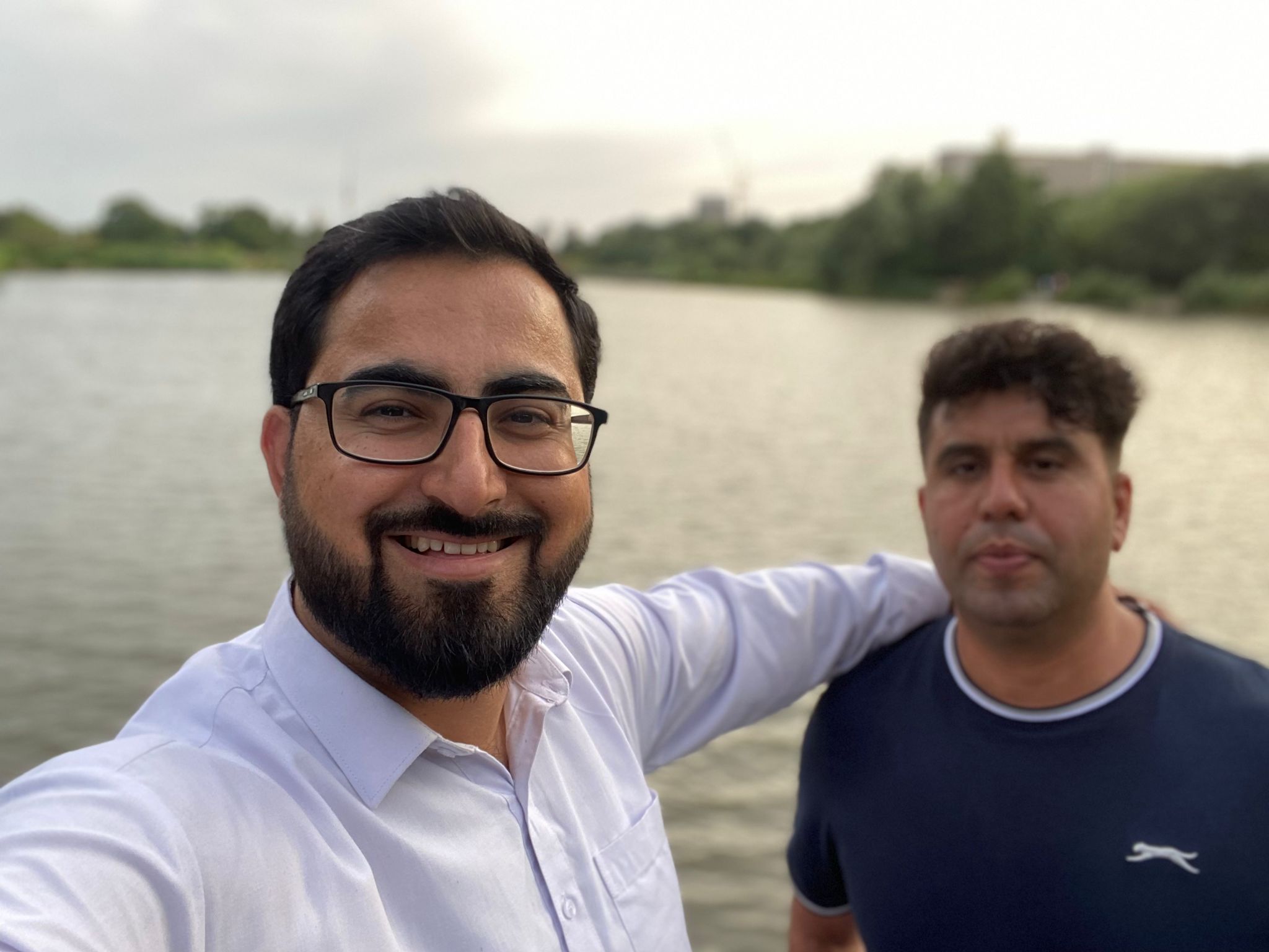 Gulwali Passarlay, author of ‘The Lightless Sky’, (left) said the Home Office was ‘making an example’ of his friend Shafiq (right)