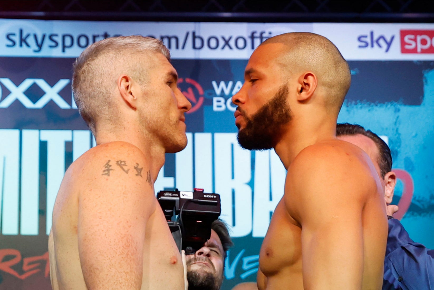 Liam Smith, left, and Chris Eubank Jr at the weigh-ins for their rematch