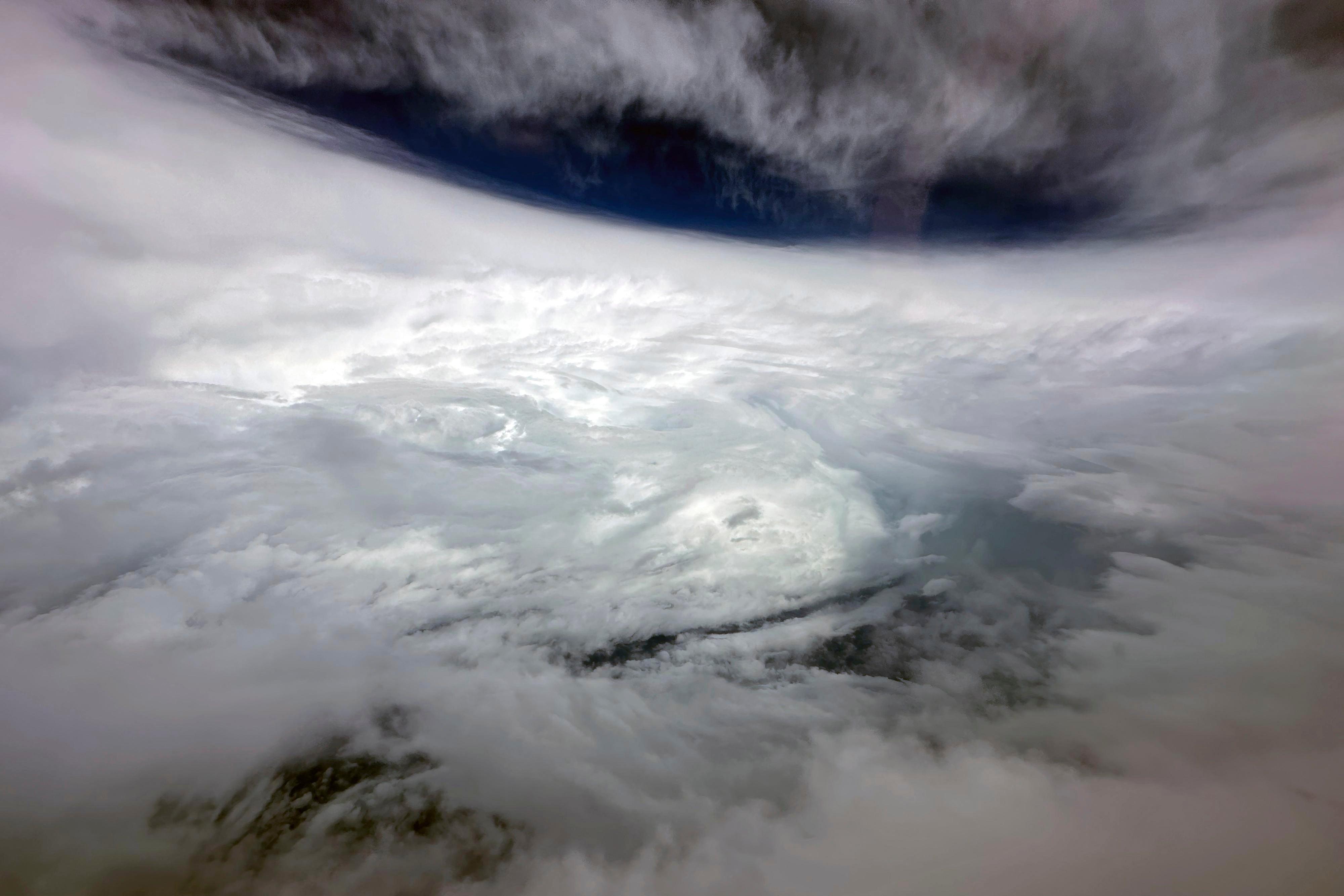 Typhoon Saola is seen from a fixed-wing weather-observing aircraft near Hong Kong on Friday