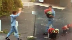 Thief waves at CCTV while stealing flower display from family business