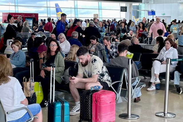 <p>Waiting game: passengers at Dublin airport waiting for UK flights on Monday 28 August 2023</p>