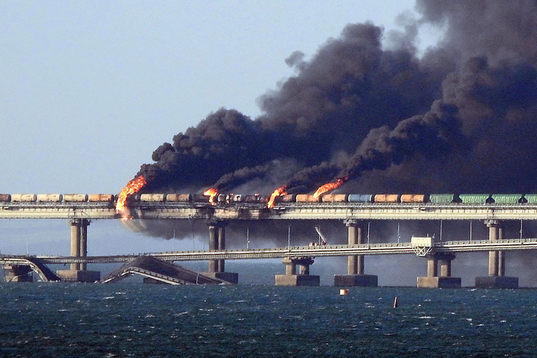 Crimea’s Kerch bridge on fire after an attack in October 2022
