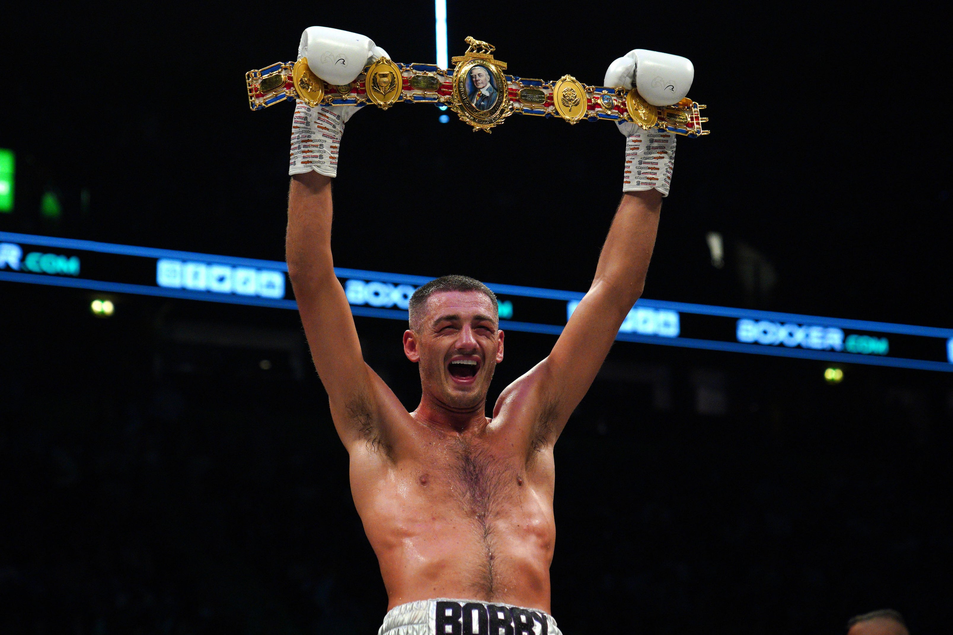 Cullen celebrates winning the British and Commonwealth super-middleweight title