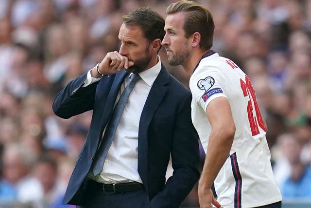 Gareth Southgate (left) feels Harry Kane’s move to Bayern Munich can benefit his England team (Nick Potts/PA)