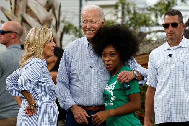 <p>U.S. President Joe Biden and first lady Jill Biden talk with a woman as they tour Hurricane Idalia storm destruction in a neighborhood of Live Oak, Florida, U.S., September 2, 2023</p>