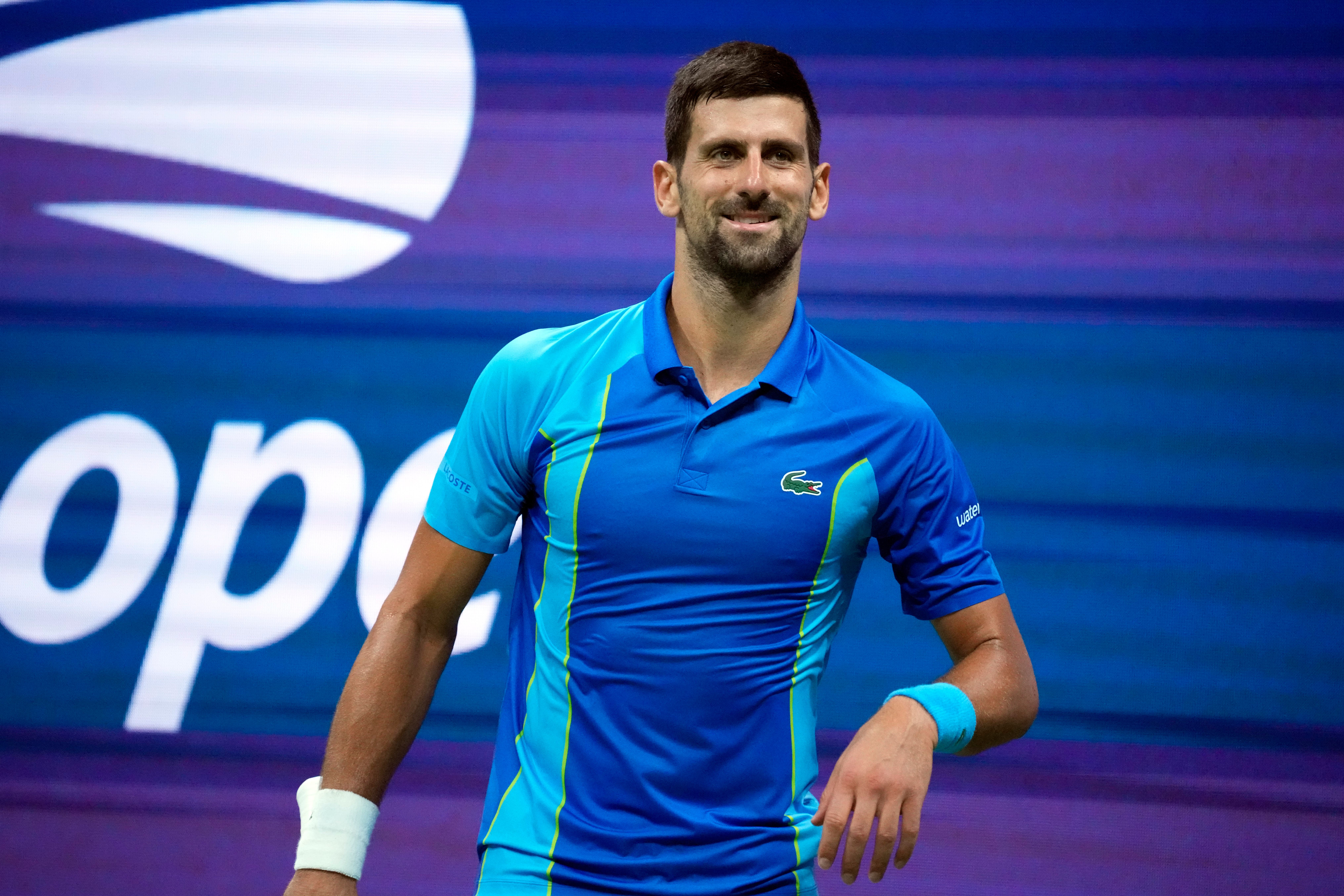 Novak Djokovic eases into 57th grand slam quarter-final | The Independent