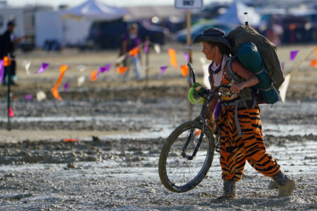 <p>Heavy downpours have turned Burning Man into a mud bath this weekend</p>