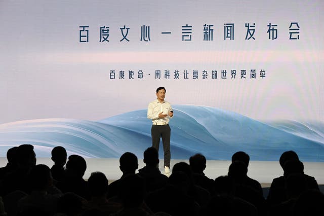 <p>Baidu co-founder and CEO Robin Li speaks at the unveiling of Baidus AI chatbot Ernie Bot at an event in Beijing on 16 March 2023</p>