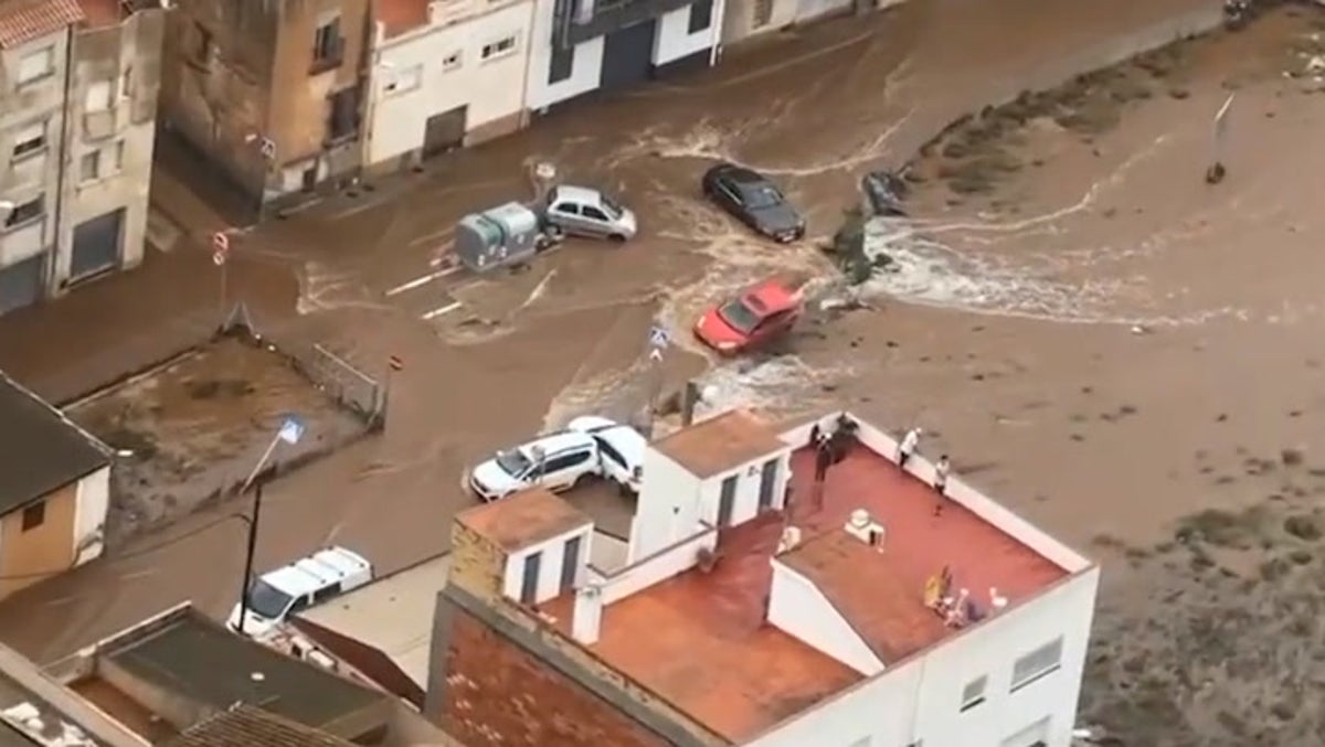 Spain floods: Cars washed away by torrential rain in aerial footage
