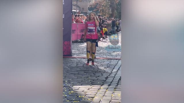 <p>Yana Stepanenko, who lost both legs in Russian missile attack, crosses finish line at half marathon.</p>