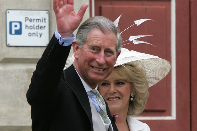 Charles, then the Prince of Wales and Camilla leaving the Guildhall, Windsor, following their wedding ceremony (Kirsty Wigglesworth/PA)