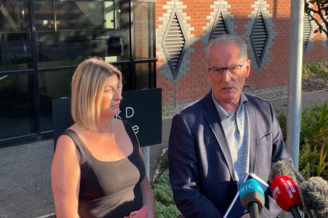 Sinn Fein MLA Gerry Kelly (right) and MLA Linda Dillon speak following an emergency meeting of the Northern Ireland Policing Board on Monday in Belfast (Rebecca Black/PA)