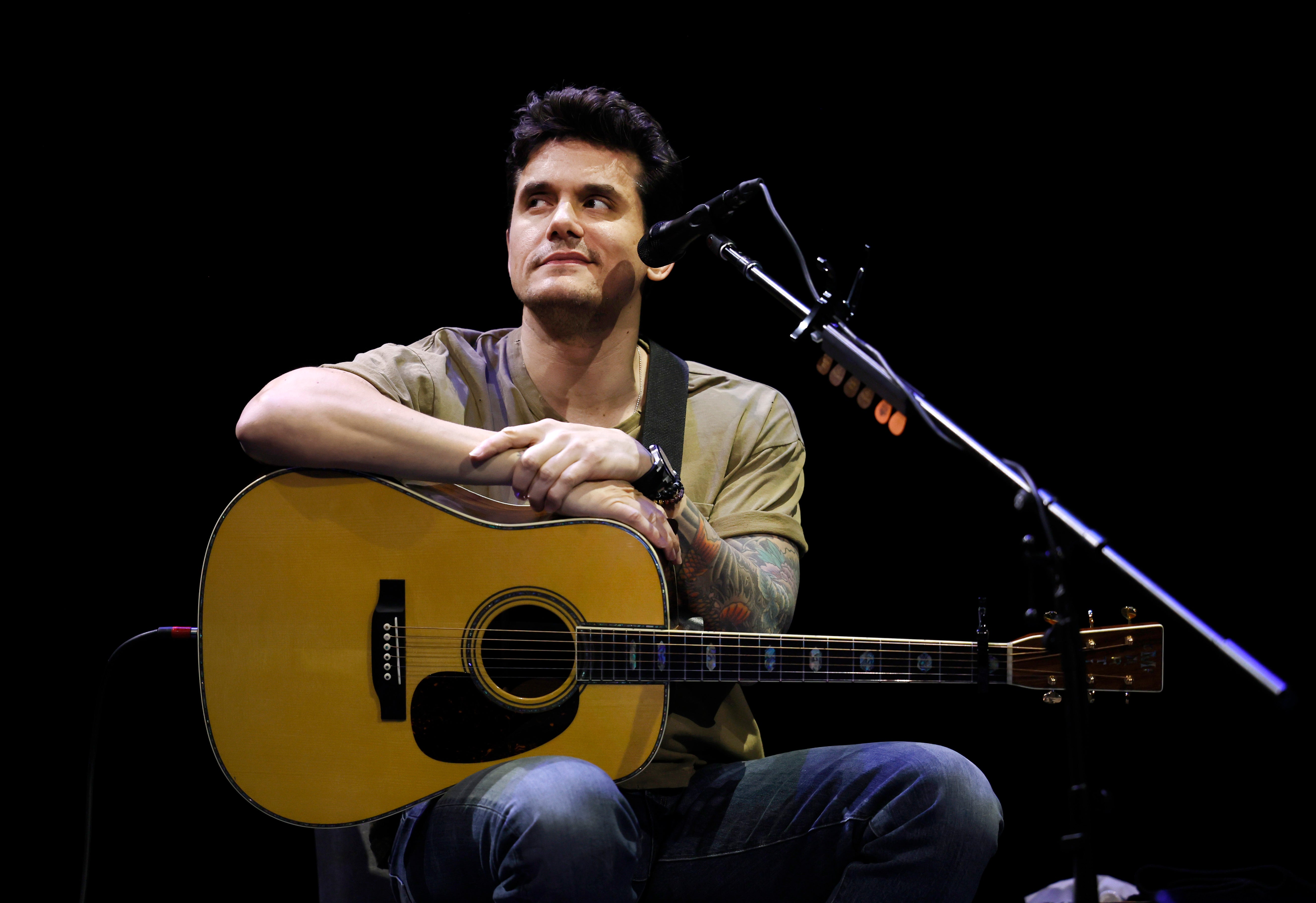 John Mayer pictured on stage in 2023
