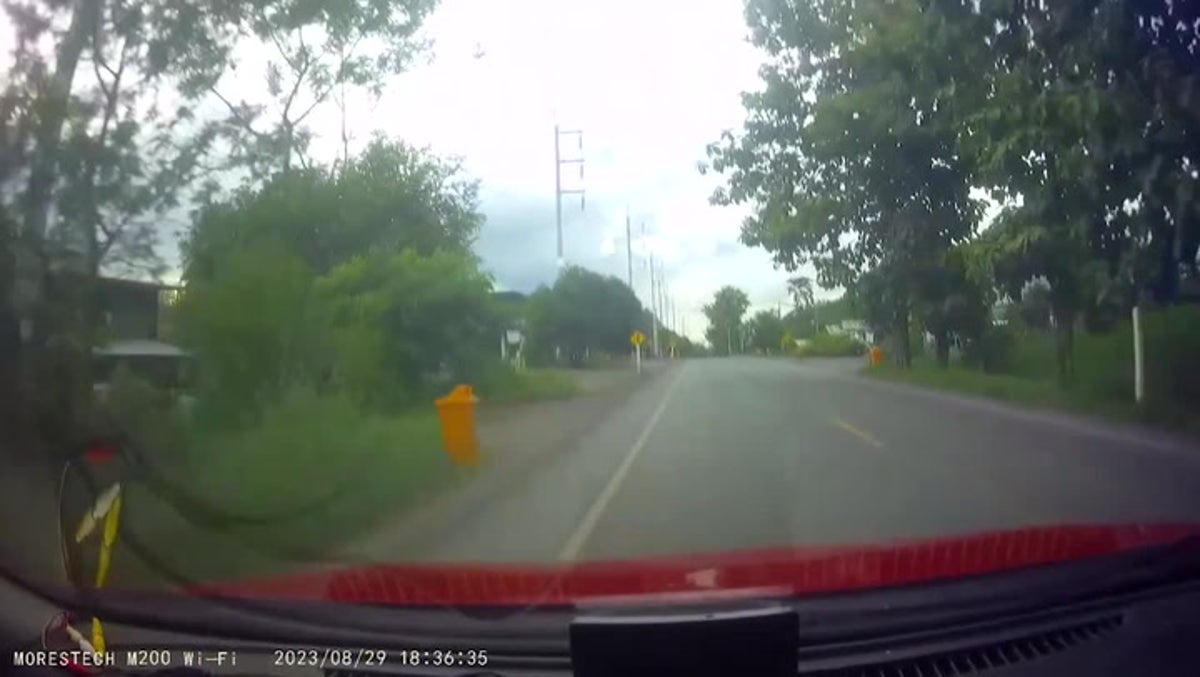 Wooden trailer detaches and smashes into oncoming car