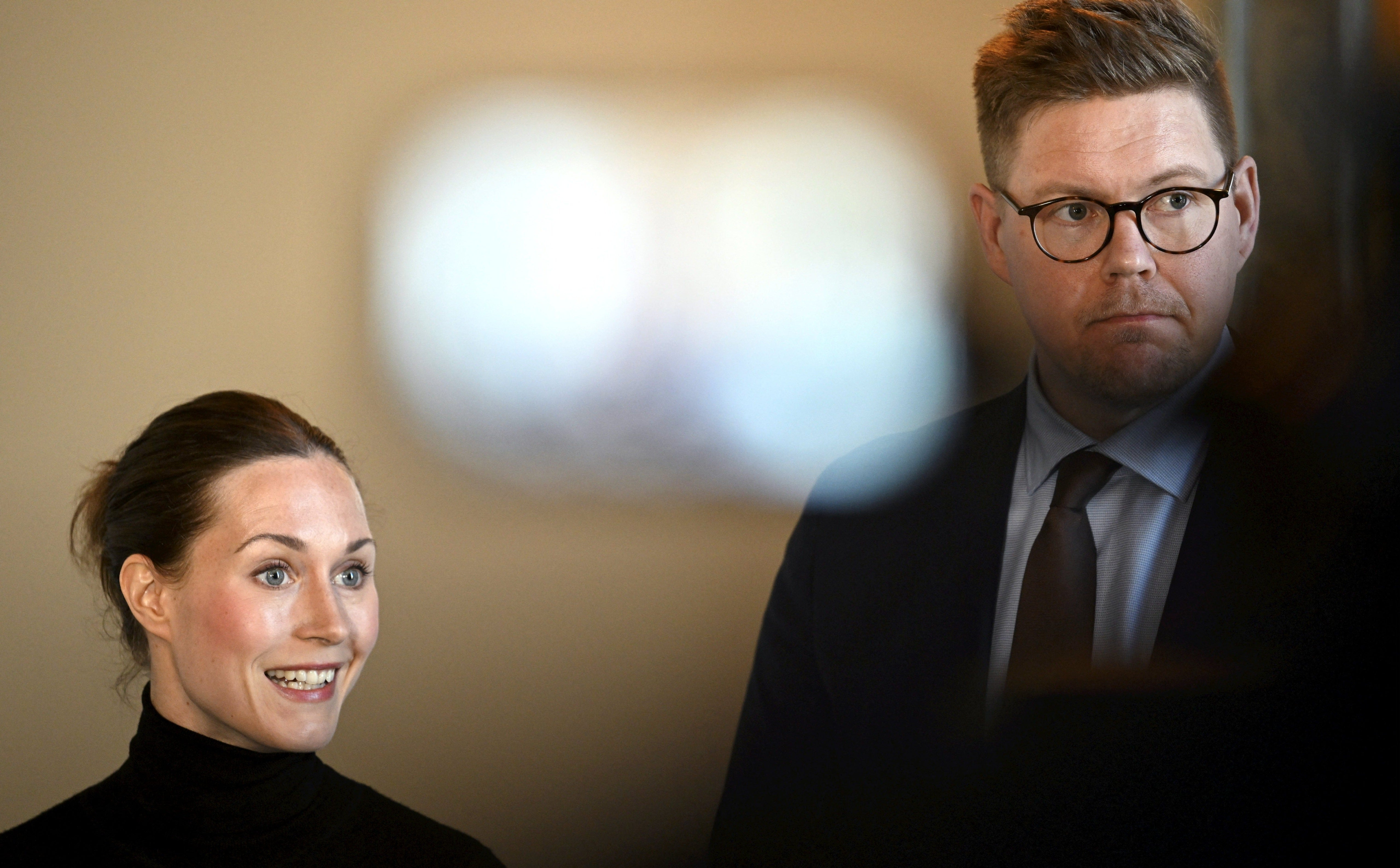 Former Finnish prime minister Sanna Marin (left) with her successor as leader of the SDP Antti Lindtman (right)