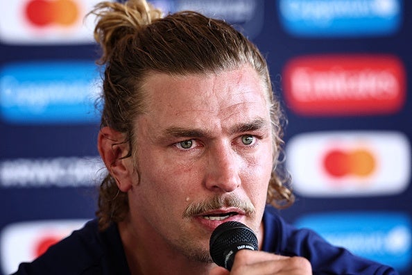 Bastien Chalureau cries during a press conference before the World Cup