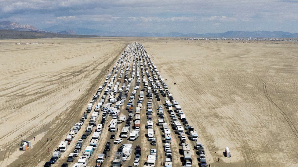 Thousands escape in a exodus from Burning Man now roads are dry enough