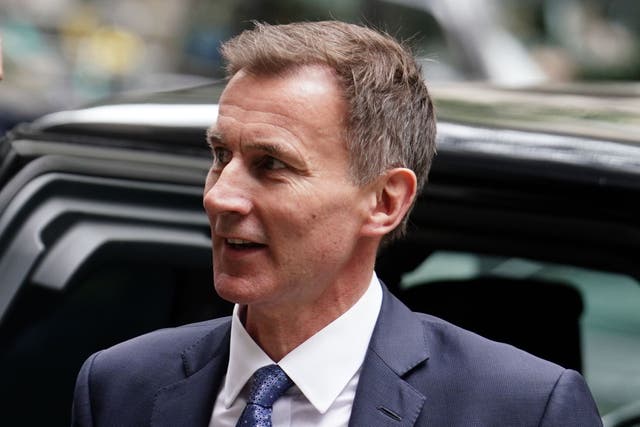 Jeremy Hunt has faced pressure from some Tory MPs to cut taxes ahead of the next general election (Jordan Pettitt/PA)