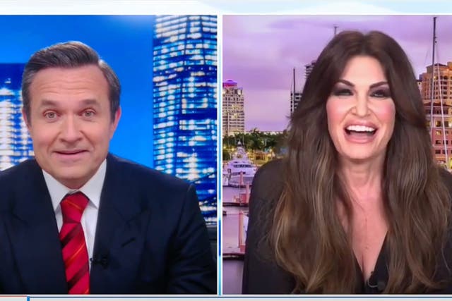 <p>Kimberly Guilfoyle was forced to defend her engagement to Donald Trump Jr in awkward Newsmax interview</p>