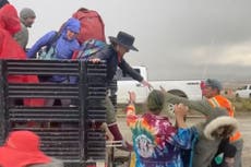 Wait times to exit Burning Man drop after flooding left tens of thousands stranded in Nevada desert