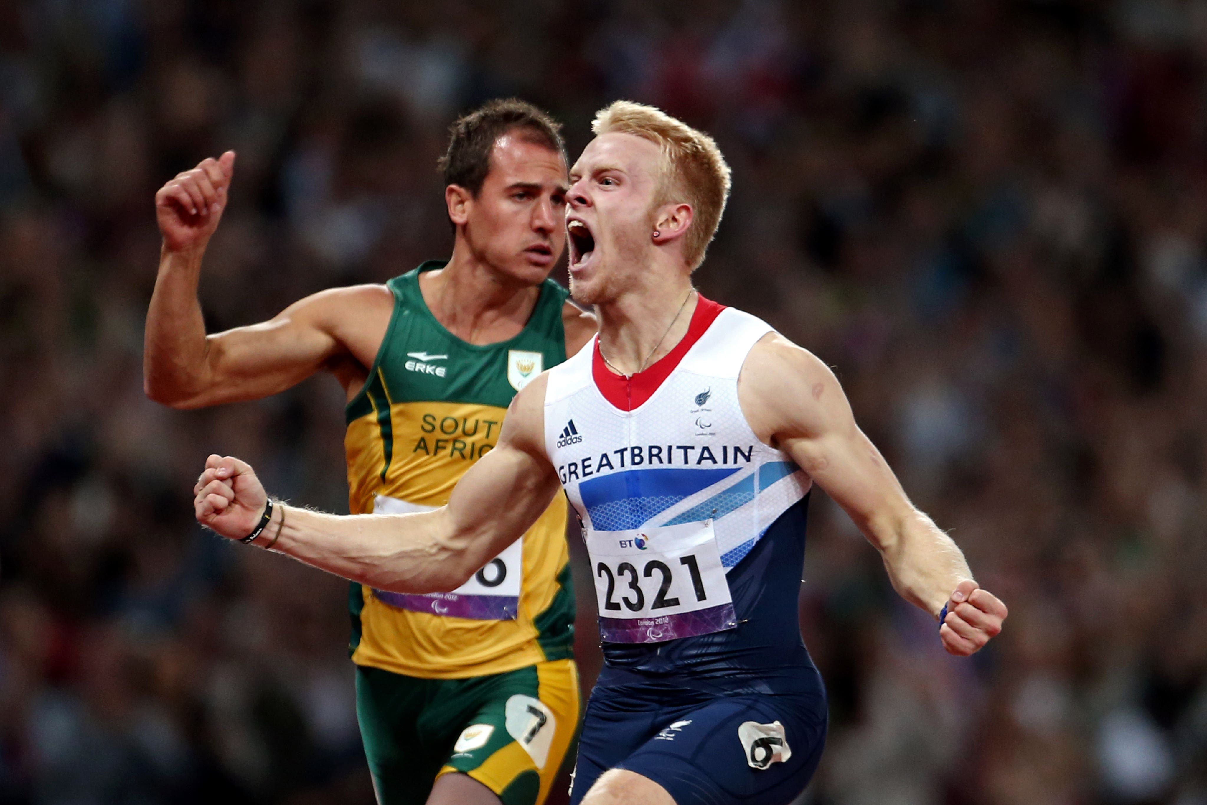 Jonnie Peacock celebrates his 100 metres victory (Lynne Cameron/PA)