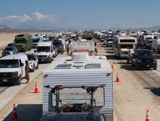 Burning Man festivalgoer’s suspected cause of death revealed as revellers still face four hour exodus – live