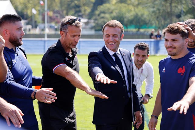 <p>Nerves? What nerves?: President Emmanuel Macron with French coach Fabien Galthie (second left) and captain Antoine Dupont (right) during training earlier this week</p>