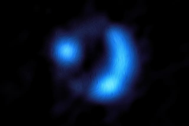 This image shows the orientation of the magnetic field in the distant 9io9 galaxy (ALMA/ESO/NAOJ/NRAO)/J Geach et al)