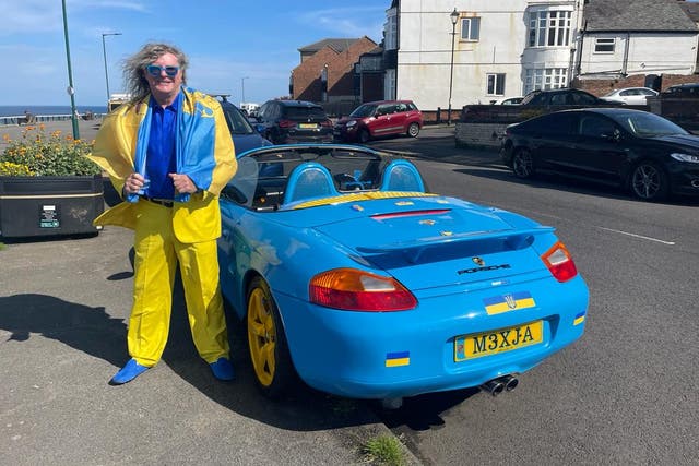 <p>Geoff Dunn and his blue and yellow Porsche</p>