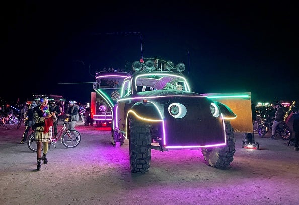 Attendees look at art cars during the annual Burning Man Festival on September 4, 2023