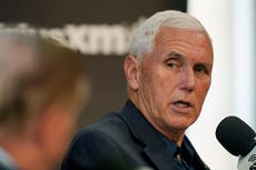 Mike Pence gives deadpan response to furious heckler at Iowa campaign event