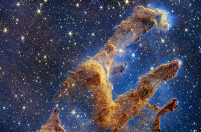 <p>Pillars of Creation are set off in a kaleidoscope of color in NASA’s James Webb Space Telescope’s near-infrared-light view</p>