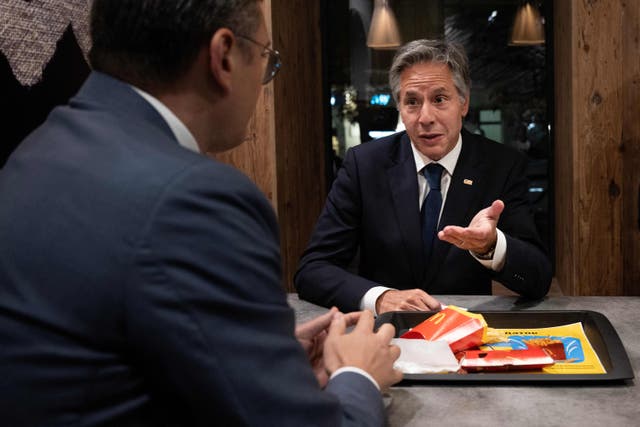 <p>Ukraine’s foreign minister Dmytro Kuleba (left) and US Secretary of State Antony Blinken (right) speak as they eat at McDonald’s in Kyiv</p>
