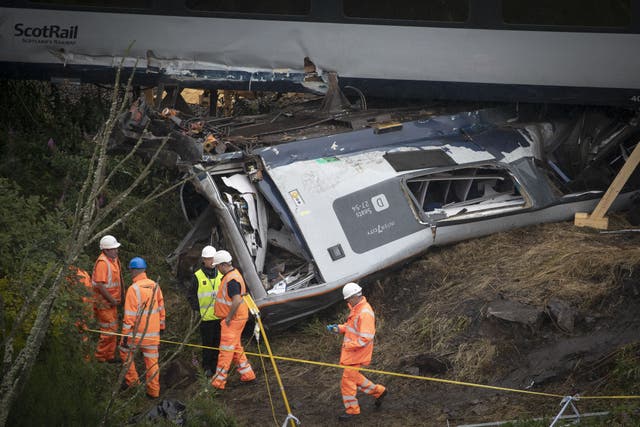 Network Rail has admitted health and safety failings which led to the derailment (PA)