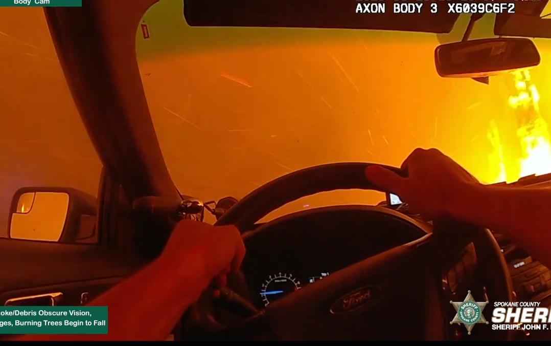 Bodycam footage from Spokane County Sheriff’s deputy Britt Morgan shows him driving through a terrifying inferno
