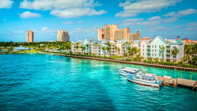 <p>Skyline of Paradise Island with colorful houses at the ferry terminal. Nassau, Bahamas.</p>