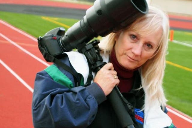 <p>Linda Gregory was taking photos at a junior varsity game when she was knocked over</p>